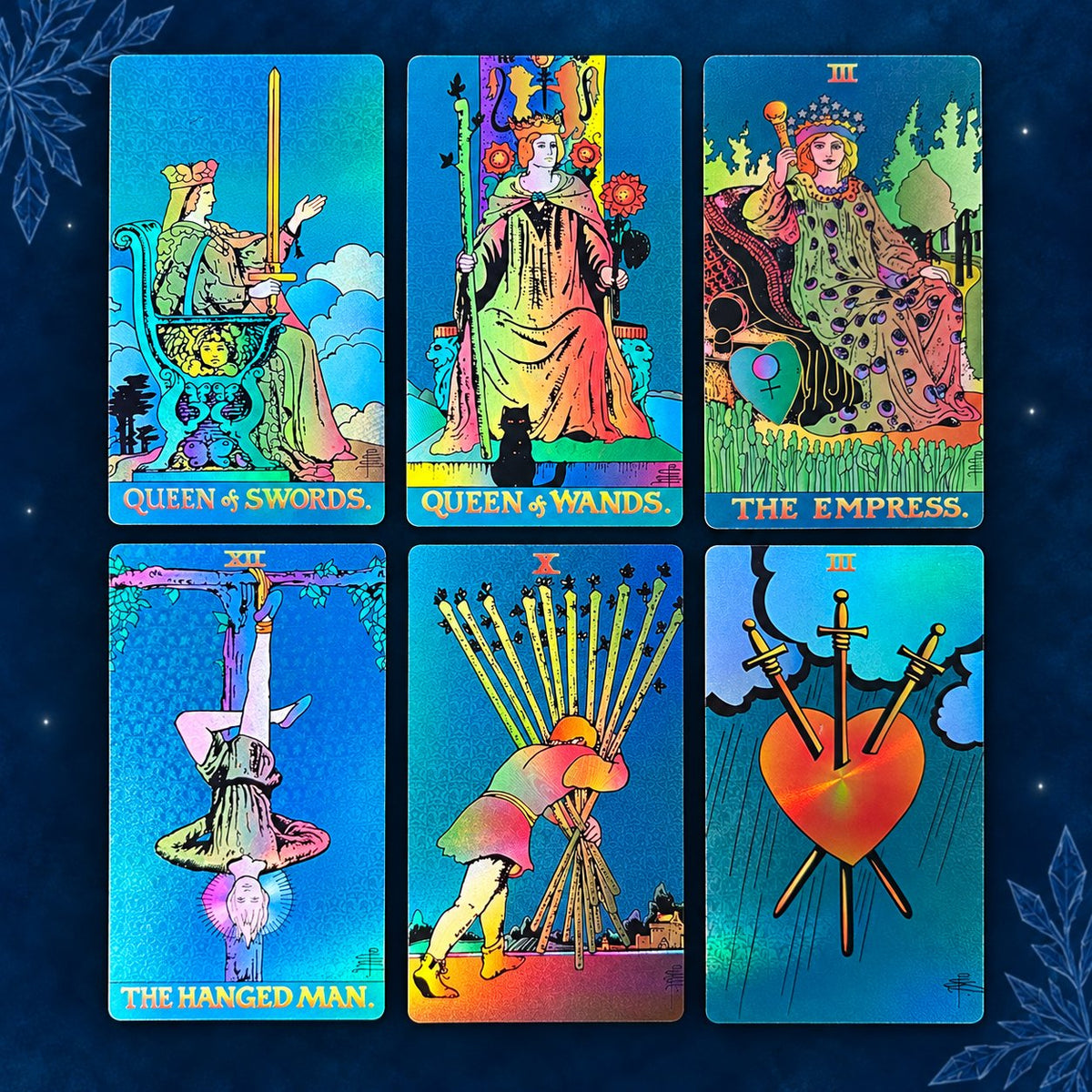 Spread of Blue Ice Crystal Tarot Major Arcana cards showcasing embossed metallic blue foil finish with crystalline sacred geometry.