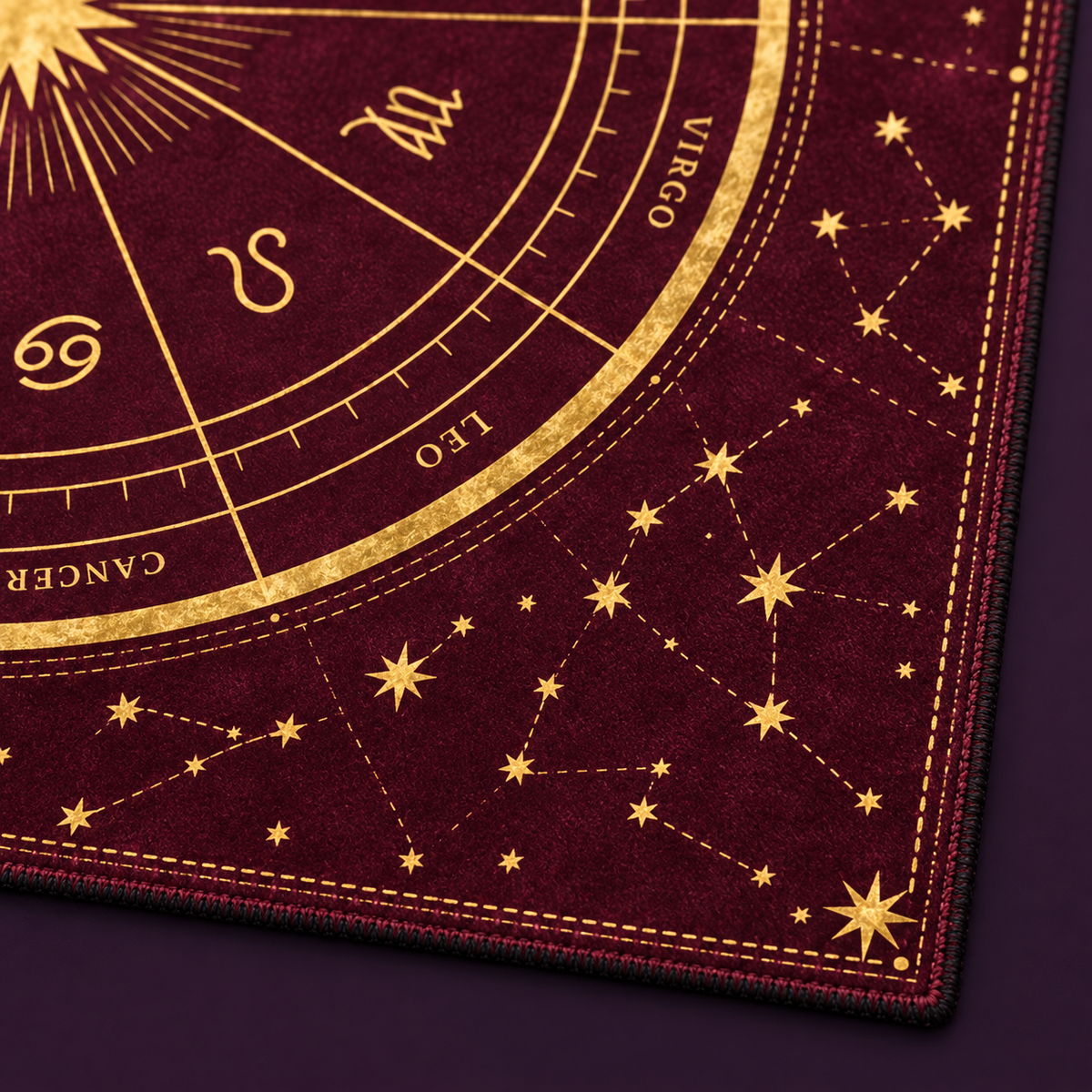 Detailed gold-stamped astrological constellations and zodiac signs at the center of the altar mat.